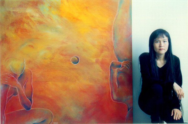 Minhquang Nguyen with her painting.